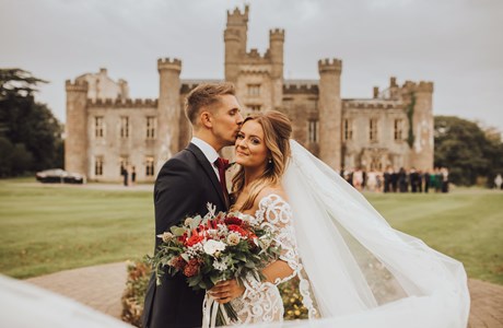 Couple in front of castle 